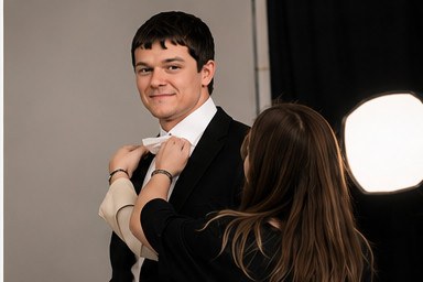 Final tie adjustment before camera — BAFTA press line.